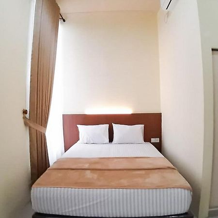Hotel Reddoorz Syariah Near Transmart Jambi 2 à Palmerah Extérieur photo
