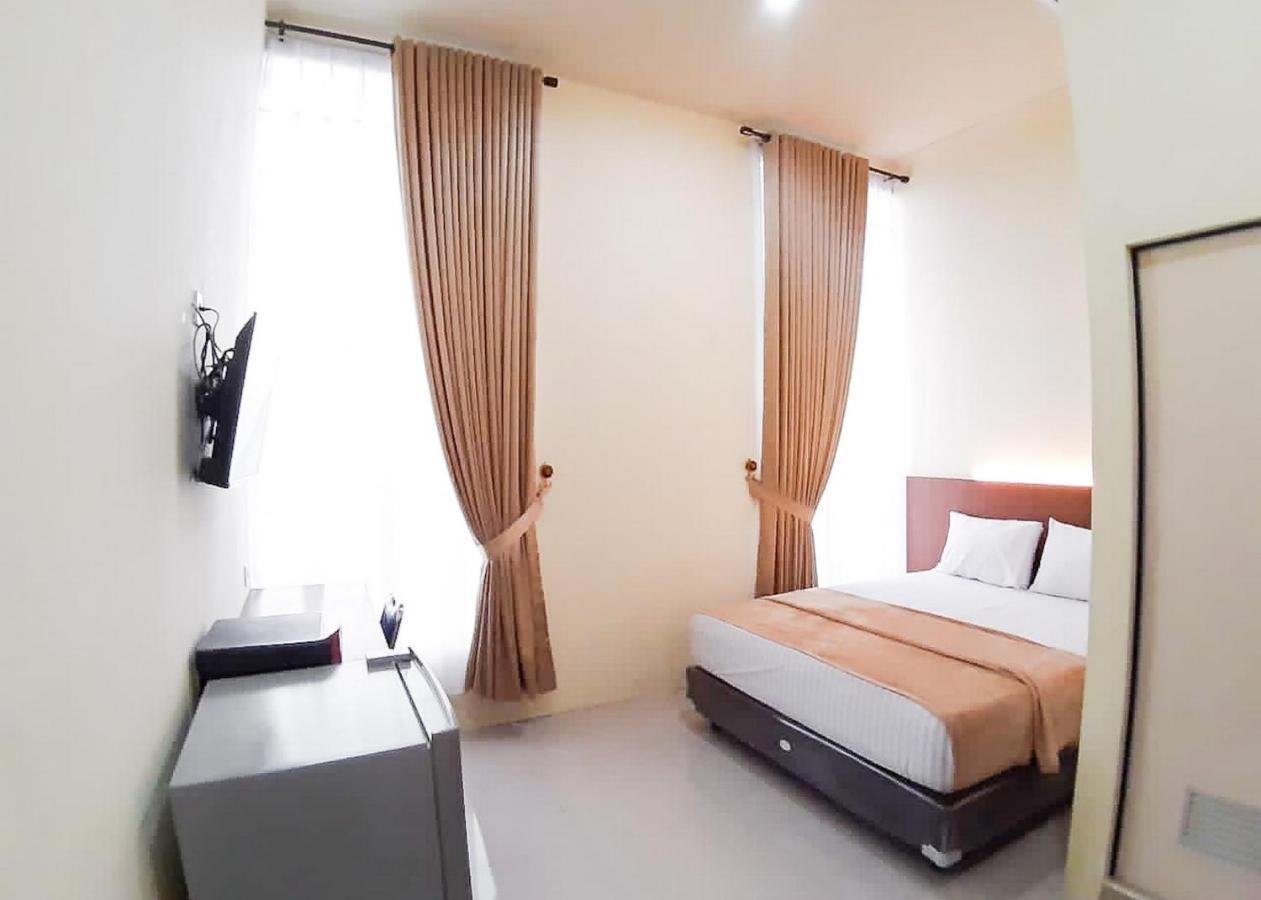 Hotel Reddoorz Syariah Near Transmart Jambi 2 à Palmerah Extérieur photo