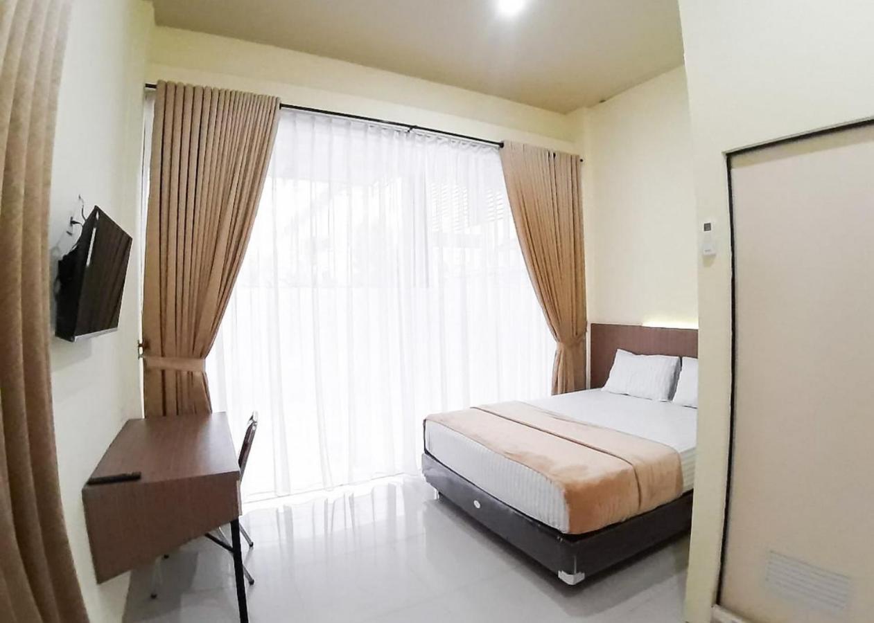 Hotel Reddoorz Syariah Near Transmart Jambi 2 à Palmerah Extérieur photo