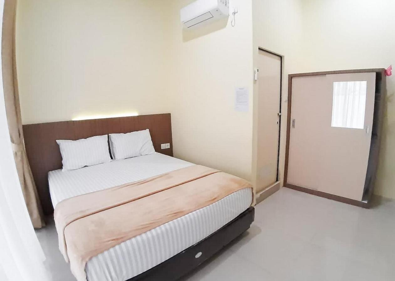 Hotel Reddoorz Syariah Near Transmart Jambi 2 à Palmerah Extérieur photo